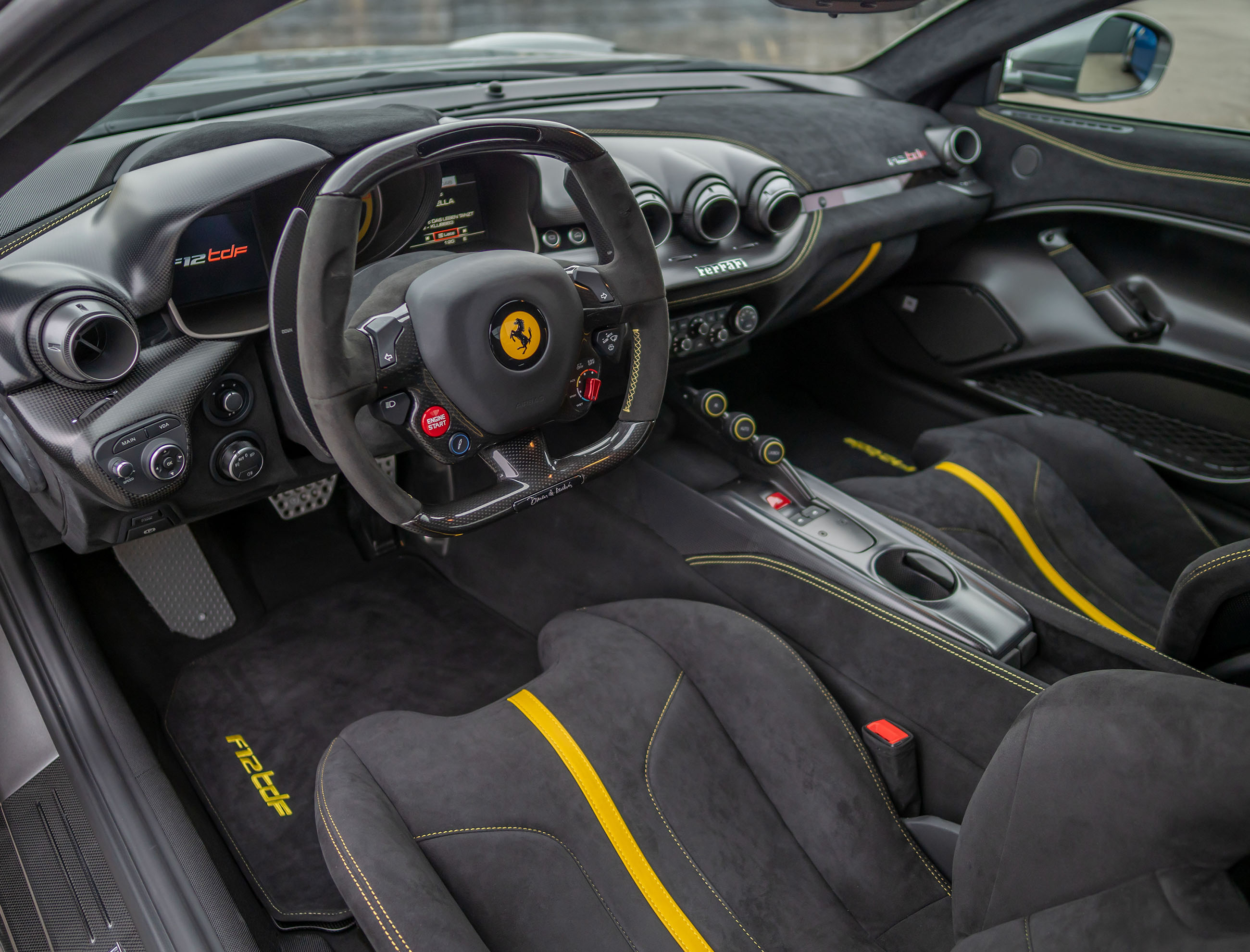 Ferrari F12tdf interior — grey Alcantara with yellow accents